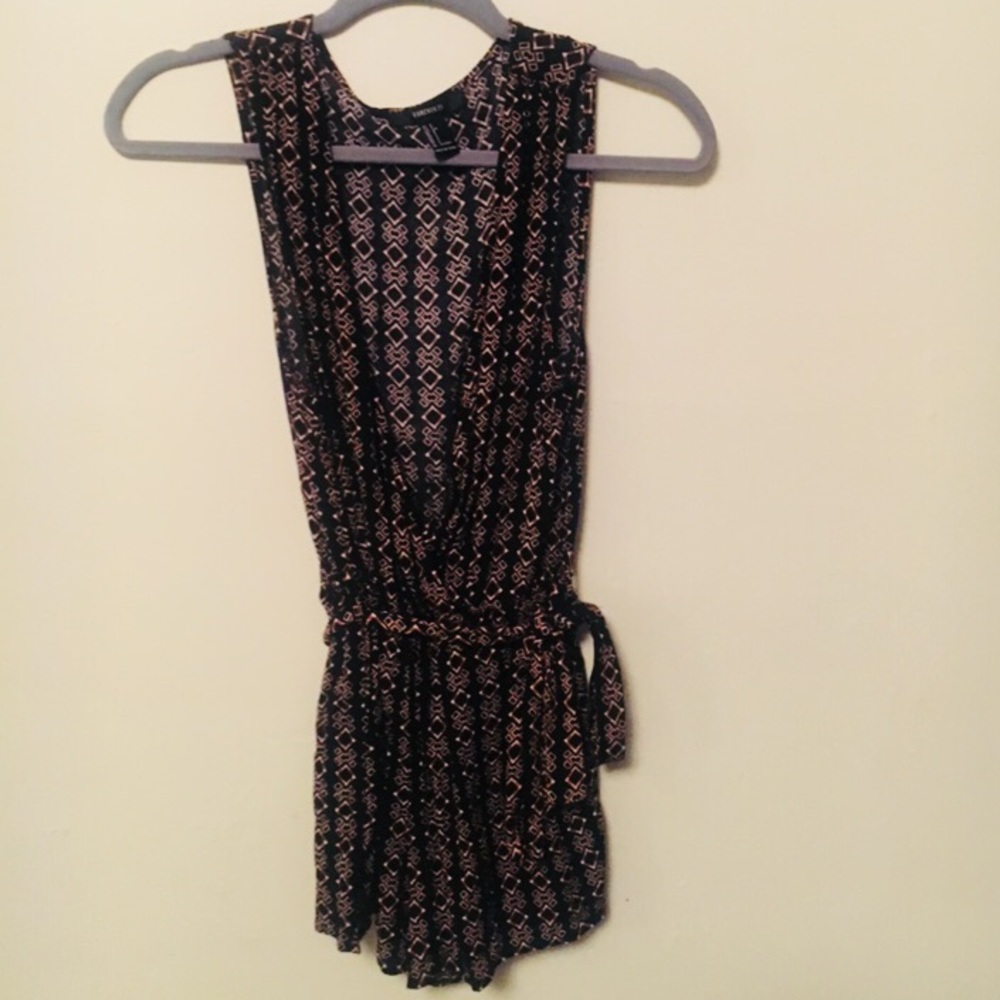 Black romper with orange design